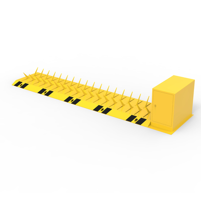 Superficie de montaje de neumáticos asesino con barrera de brazo electromecánico amarillo/negro de color pintado